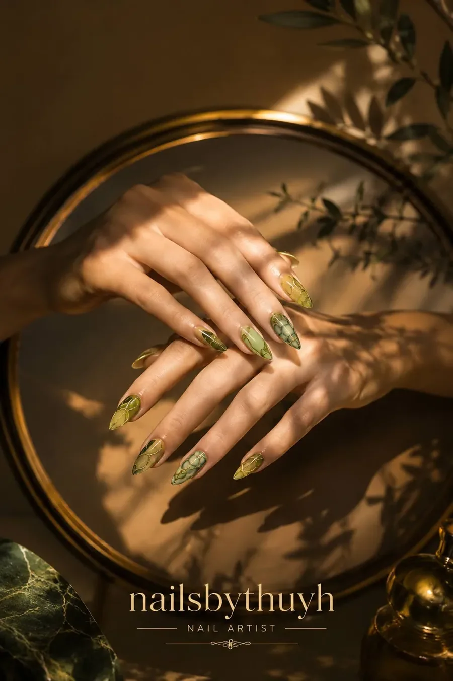 Botanical gel-X nail extensions with freehand art by Thuy — nail studio Austin TX