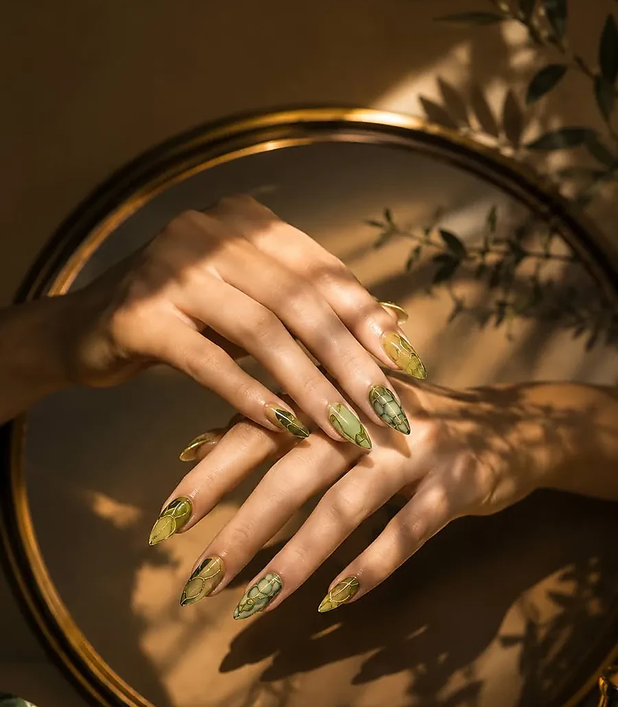 Freehand gel-X nail art by Thuy — botanical design on almond nails, Austin TX